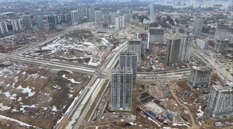 A top-down view of an abandoned city with tall buildings